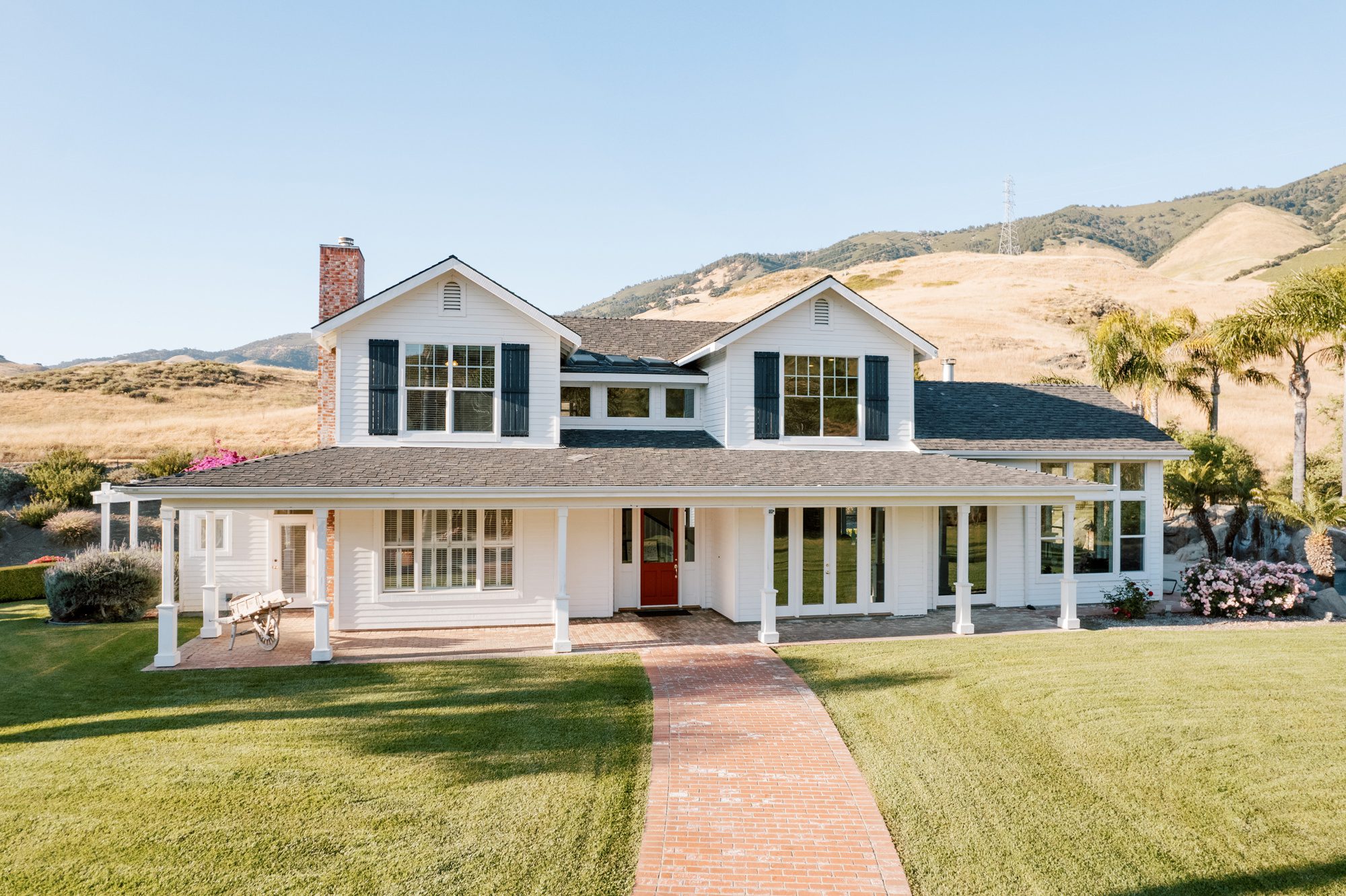 Front view of main house of Higuera Ranch airbnb luxury house rental surrounded by the san luis obispo hills, two minutes from downtown SLO