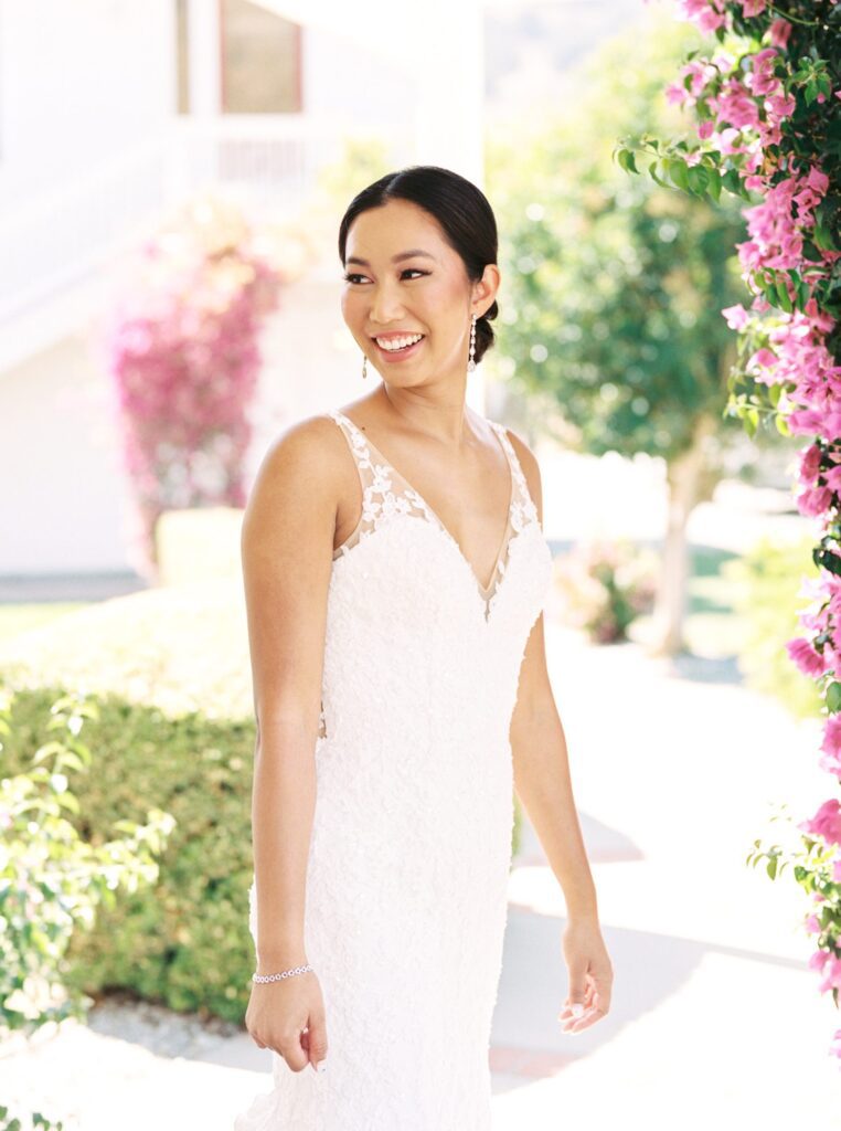 Asian Bride smiling at San Luis Obispo Wedding Venue Higuera Ranch photographed by Fine Art Film Photographer Tina Loveridge of Loveridge Photography